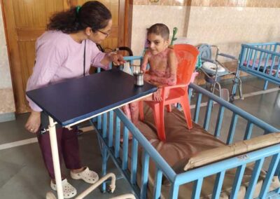 Food, clothes, and diapers distributed at Mother Teresa Home, Pratap Nagar, Jaipur.
